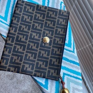 Vintage Fendi clutch purse. No rips or tears. From a non smoking pet free home.